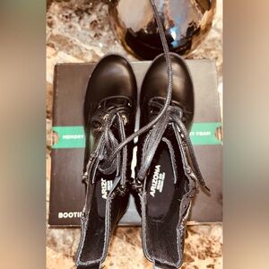 Brand new Black leather Boots.
